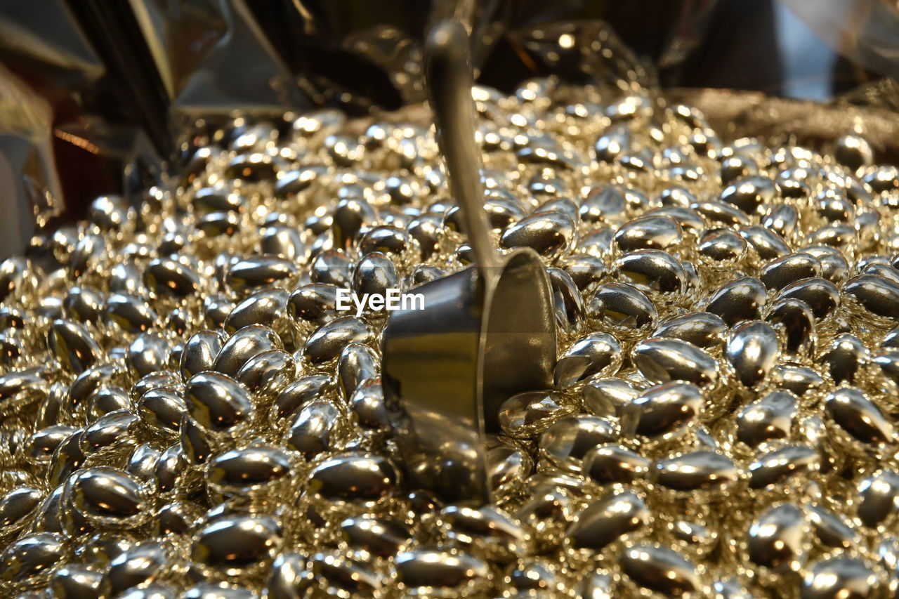 Close-up of wedding rings on table