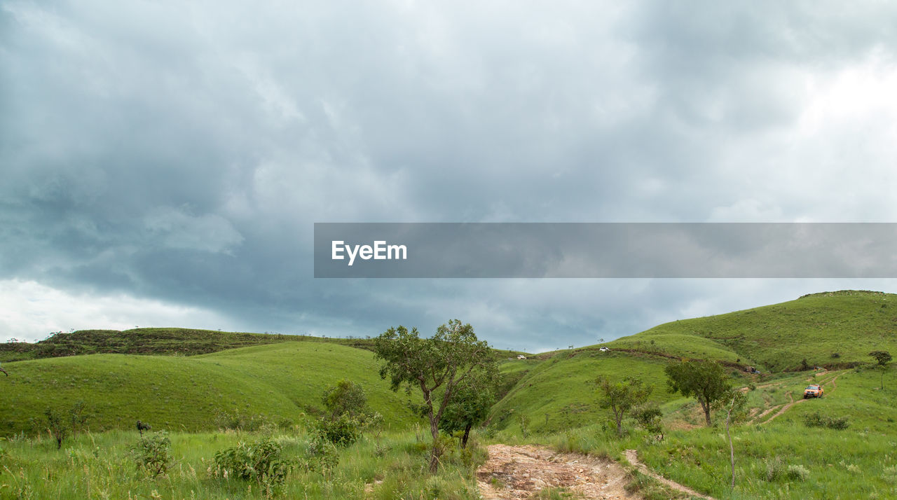 Scenic view of land against sky