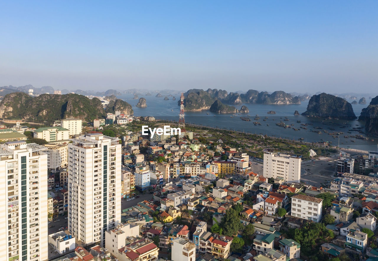 High angle view of buildings against sky in city