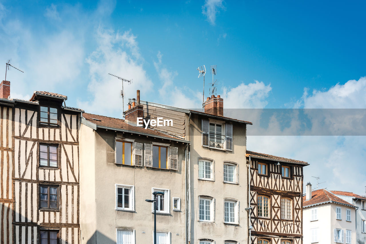 Low angle view of buildings against sky