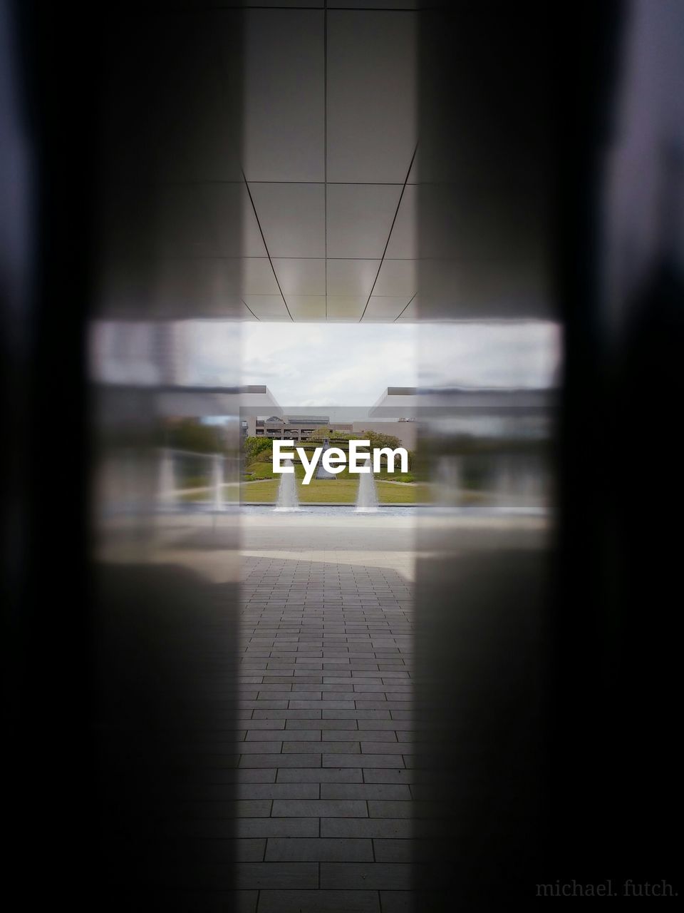 Fountains seen through door