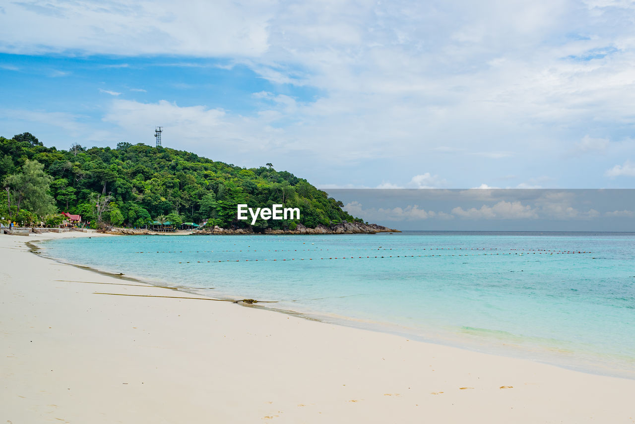 Scenic view of sea against sky of pataya beach, lipe island, thailand. 