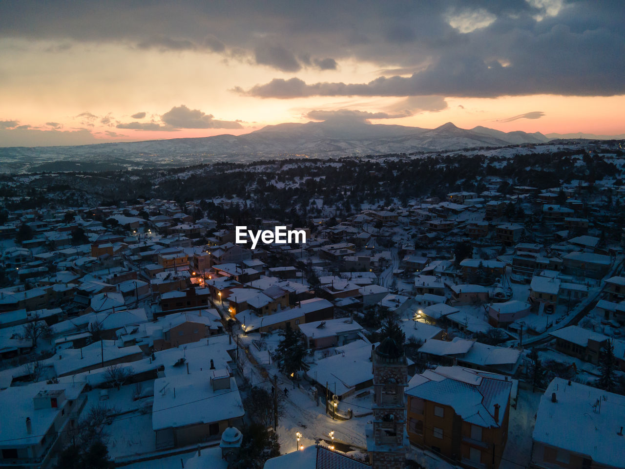 High angle view of townscape against sky during sunset