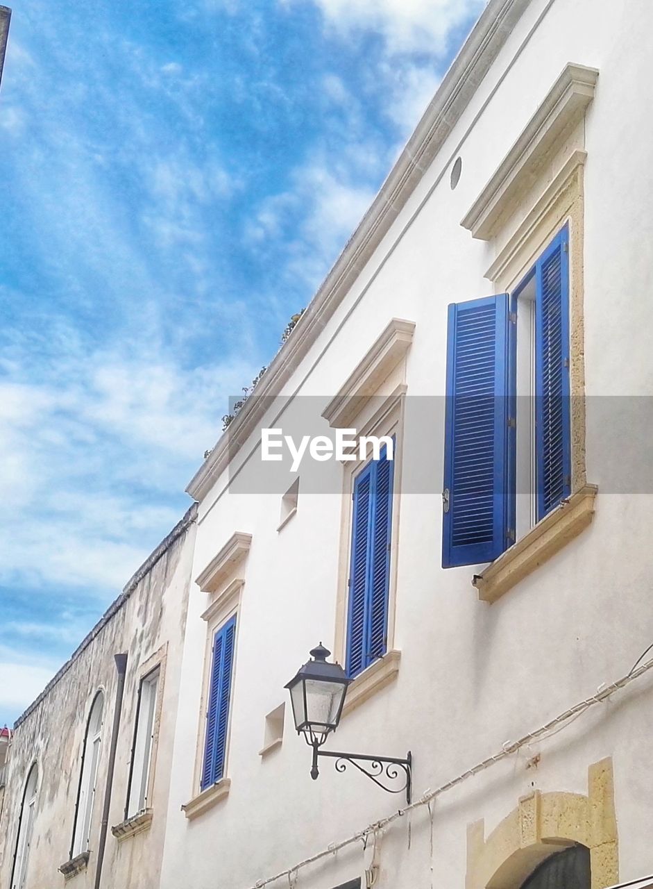 Low angle view of residential building against sky