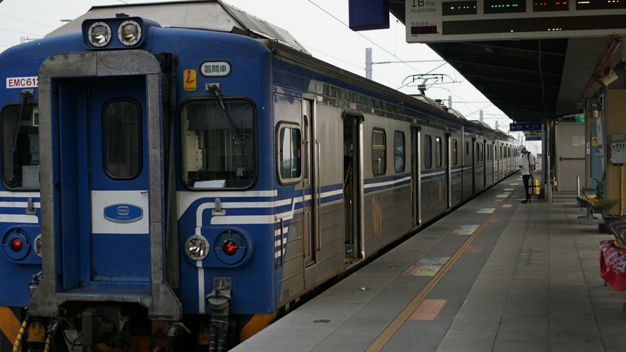 TRAIN ON RAILROAD STATION