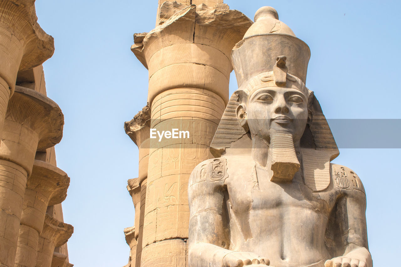 Detail of a sculpture of ramses ii in luxor temple