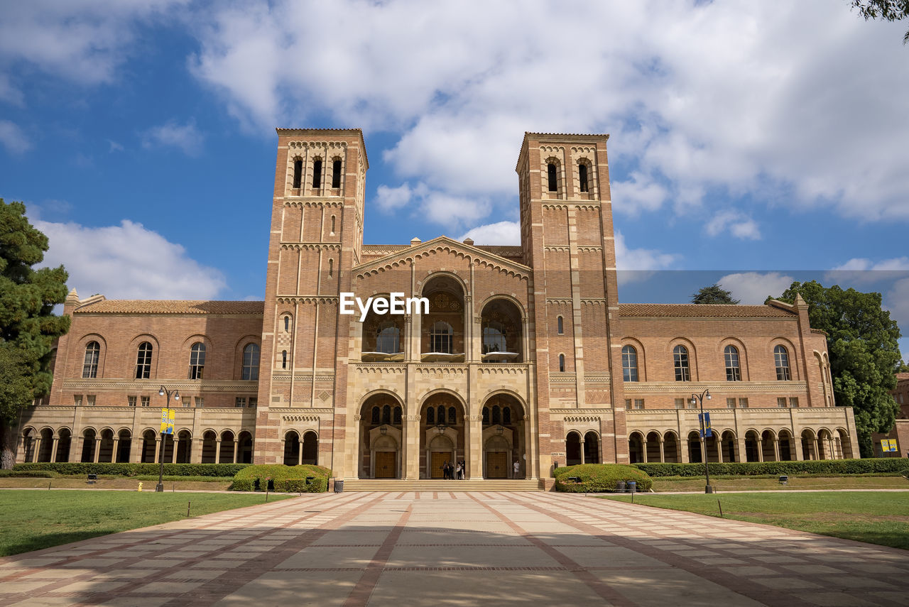 Exterior of royce hall building in the campus of ucla under cloudy sky