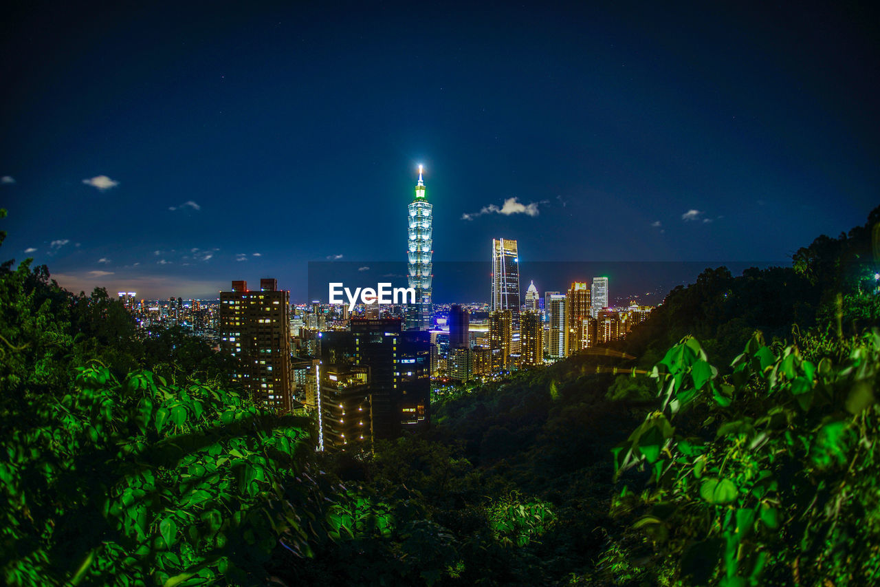 illuminated buildings in city