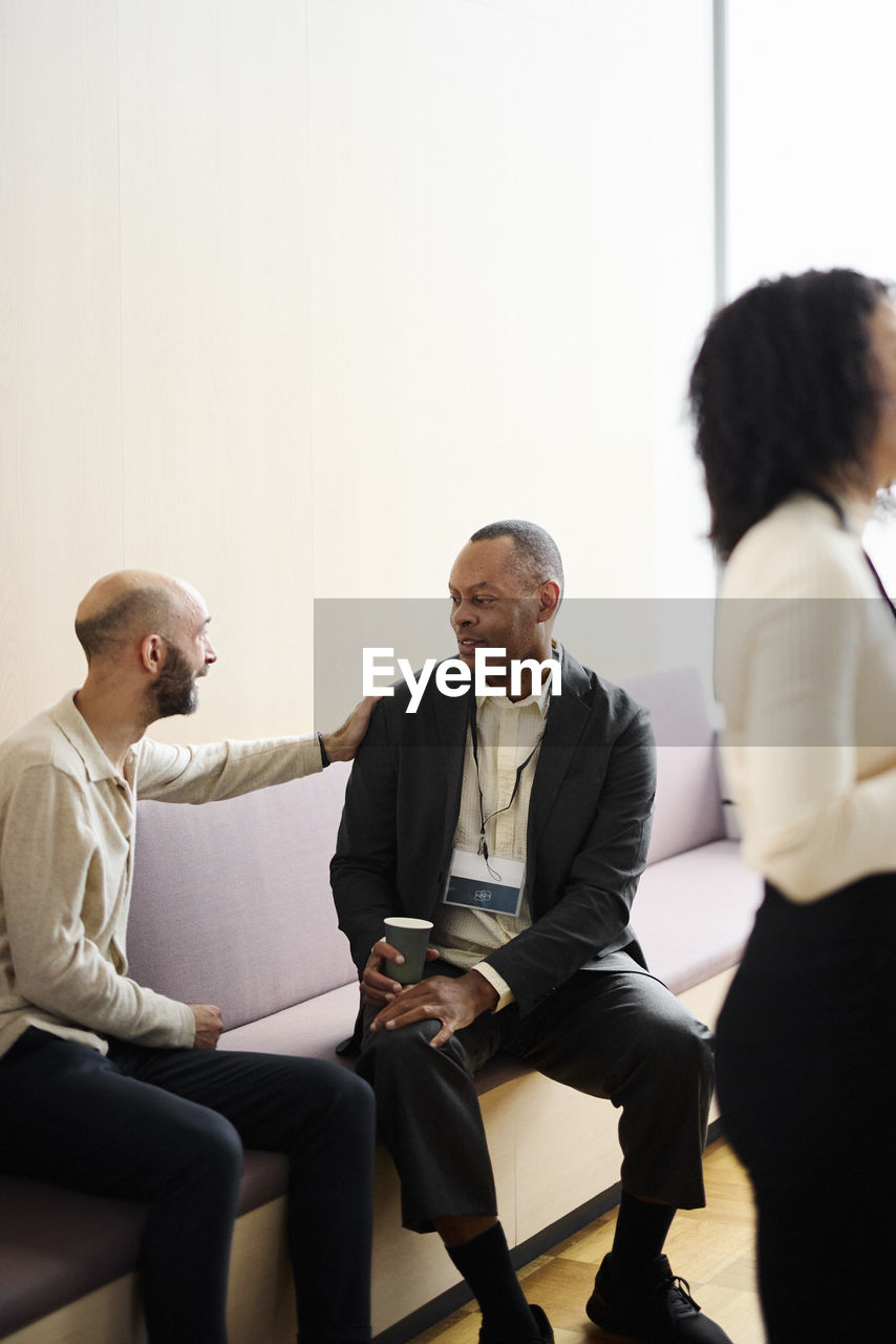 Business people talking during coffee break