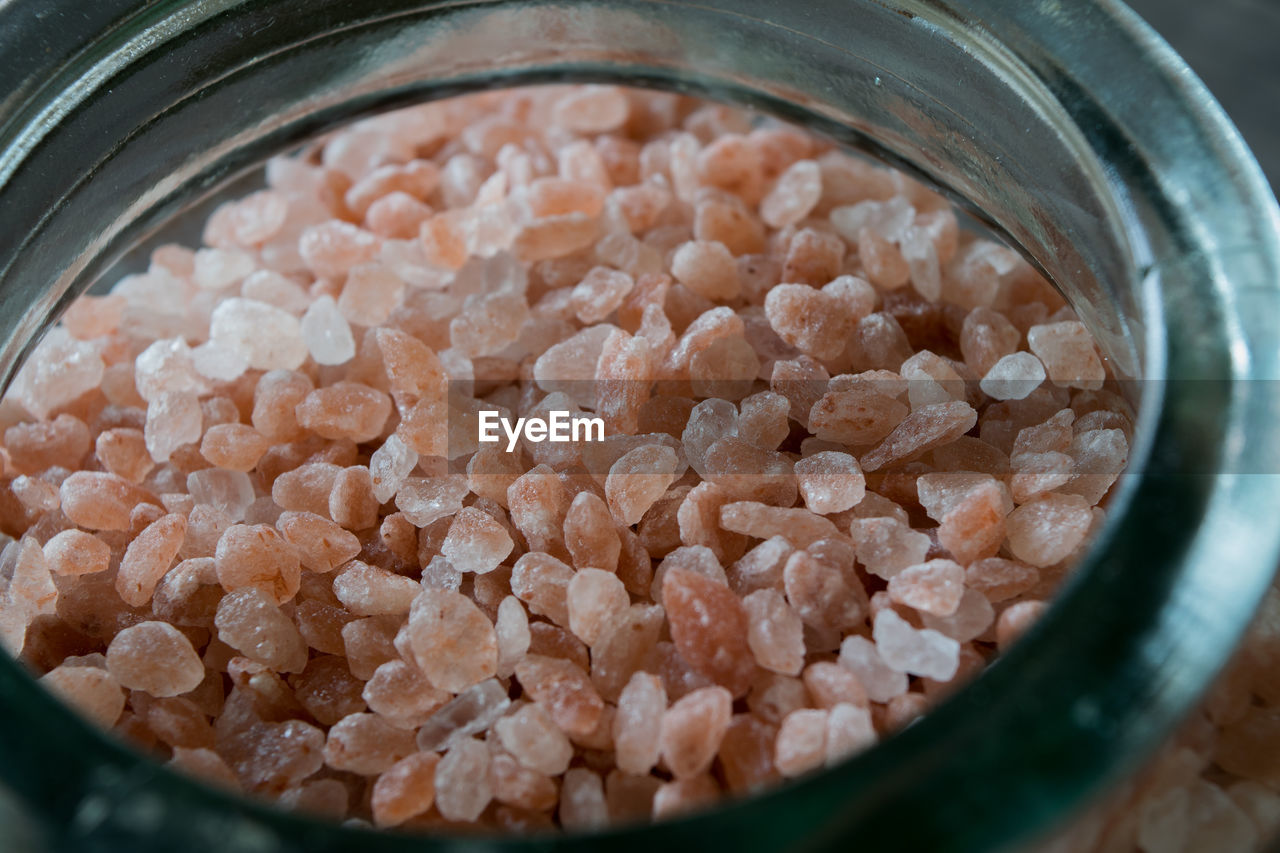 High angle view of sea salt in container