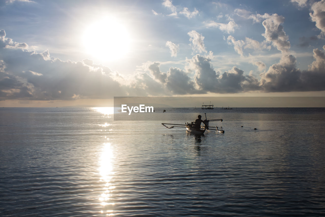 VIEW OF PEOPLE IN SEA