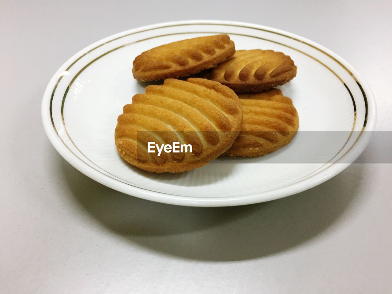 Close-up of biscuits in plate on table