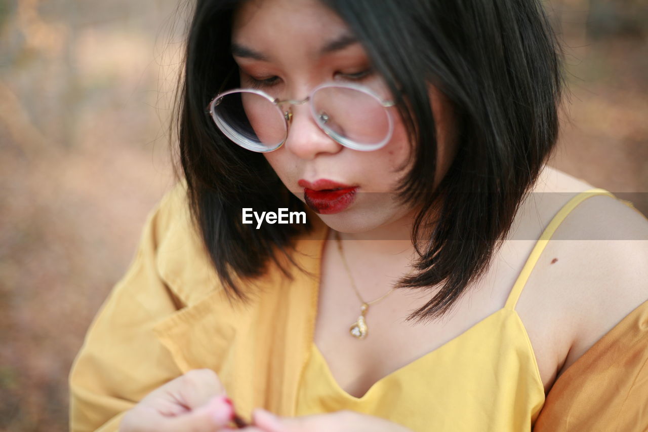 Portrait of beautiful woman wearing sunglasses