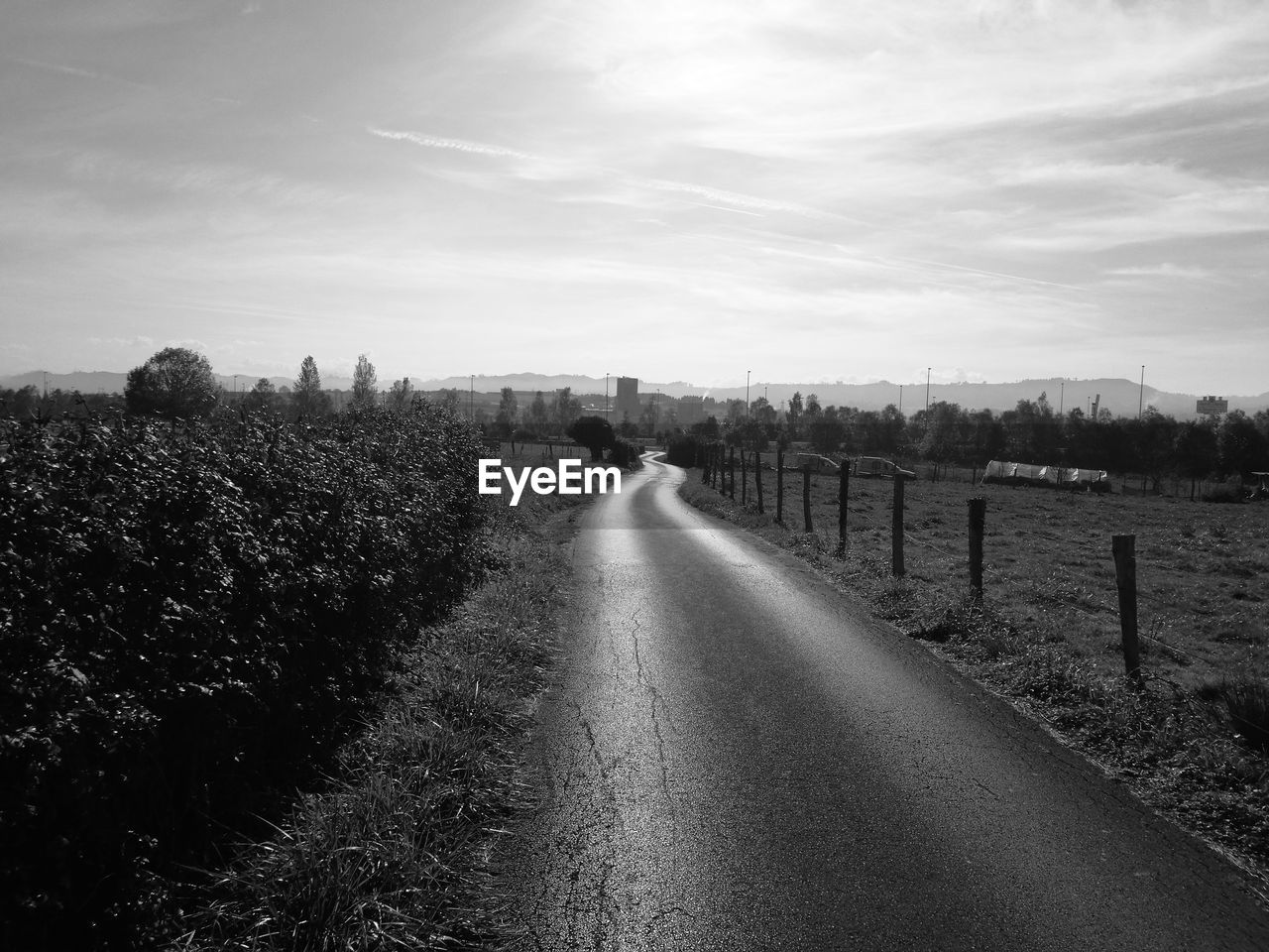 EMPTY ROAD AGAINST SKY