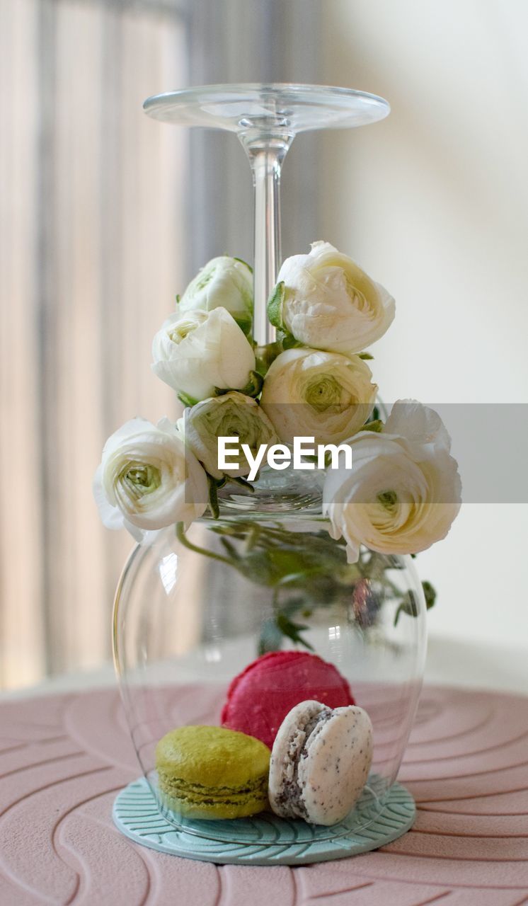 CLOSE-UP OF ROSES IN VASE