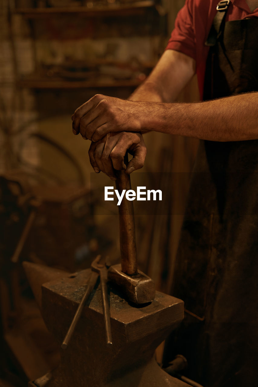 Man working on metal structure