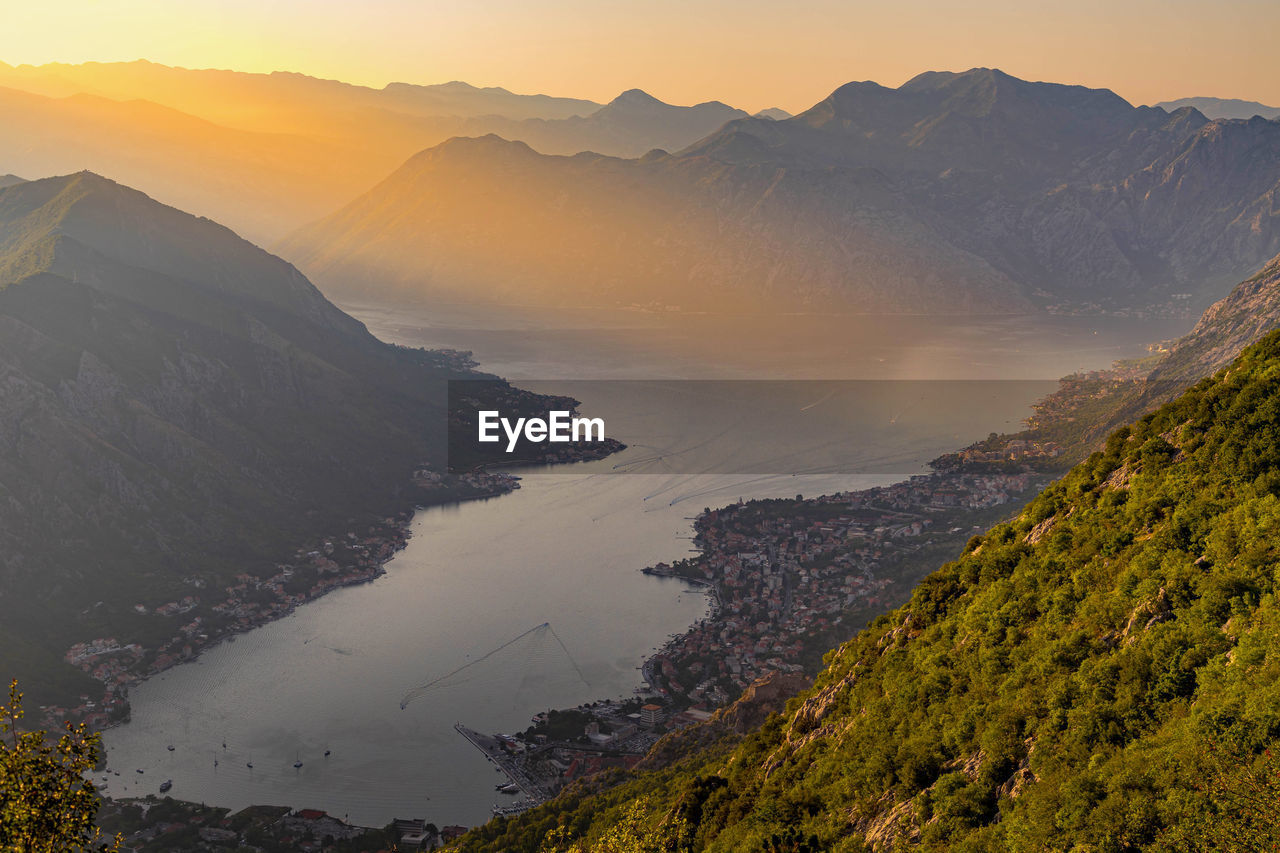 Scenic view of mountains against sky during sunset