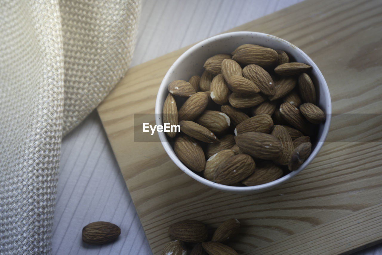 High angle view of almond in bowl on table