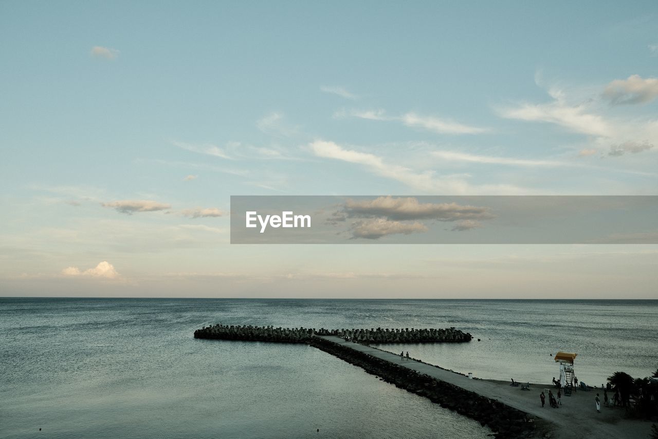 water, sky, sea, horizon over water, horizon, beauty in nature, scenics - nature, body of water, cloud, shore, nature, tranquility, beach, ocean, tranquil scene, land, morning, coast, dusk, idyllic, wave, reflection, bay, outdoors, day, non-urban scene, sunrise, men