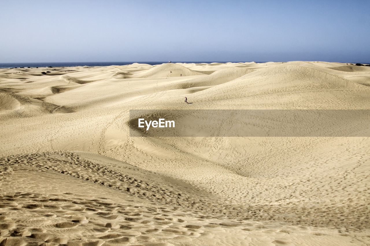 Scenic view of dessert against sky