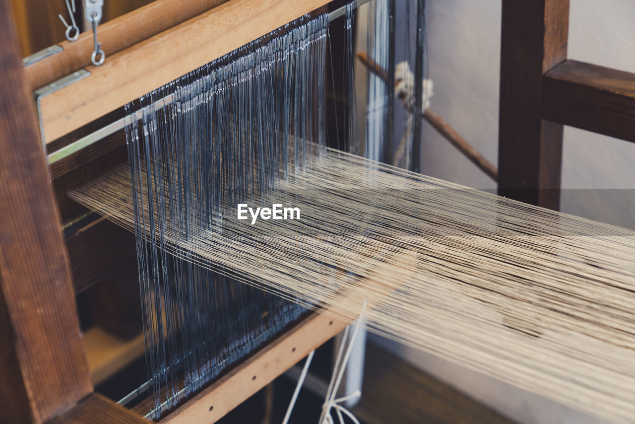 Close-up of loom in factory