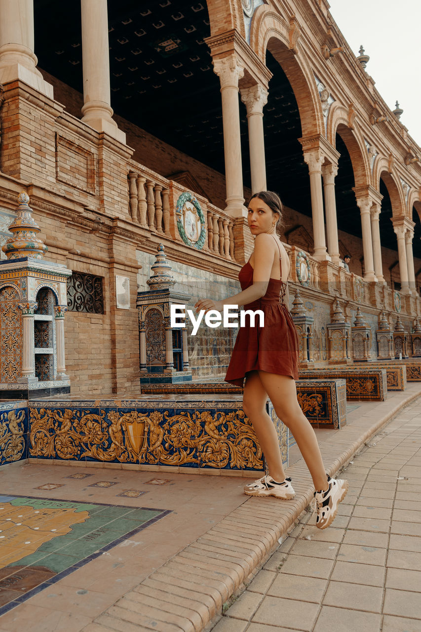 Woman walking at plaza de espana 