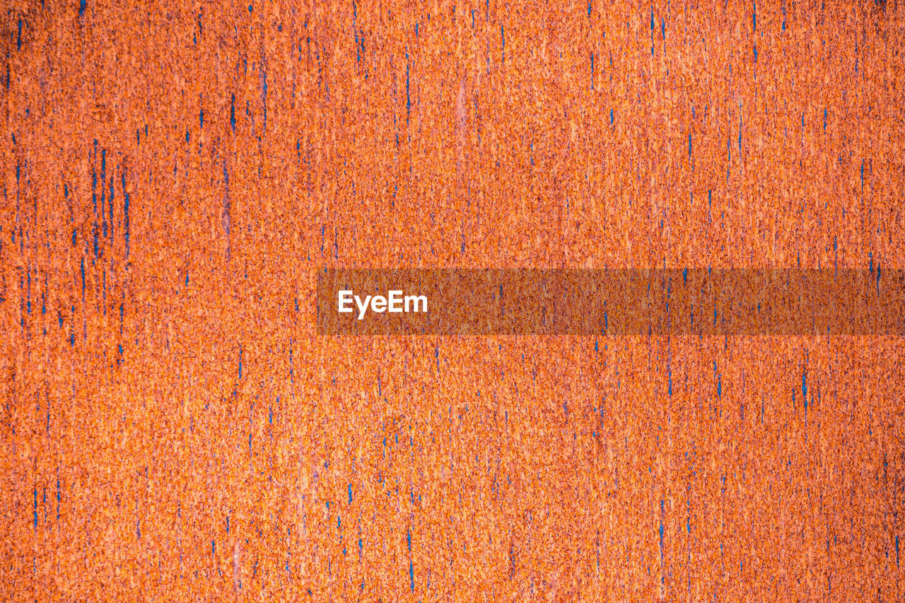 Rusty red orange metal texture background for interior exterior decoration and industrial