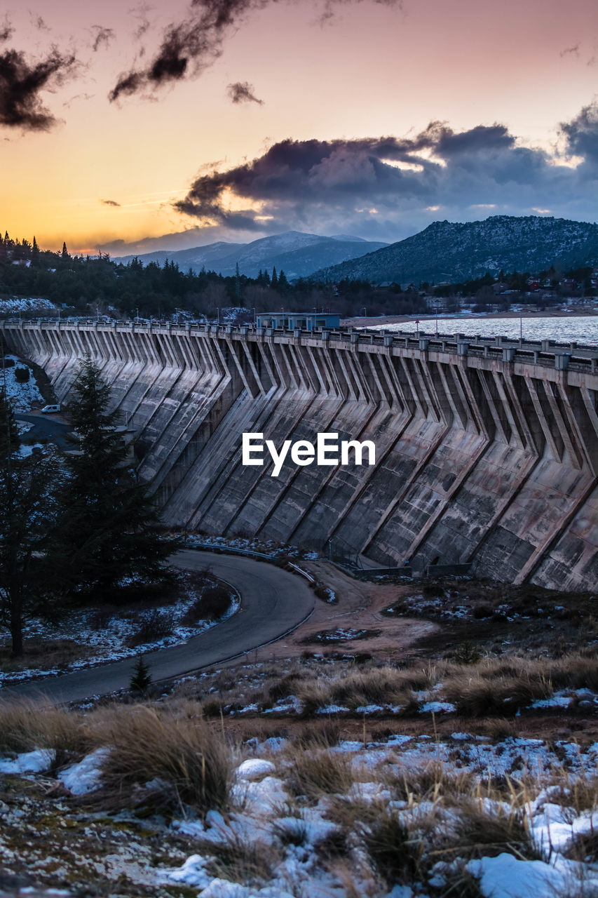 SCENIC VIEW OF DAM AGAINST SKY DURING WINTER