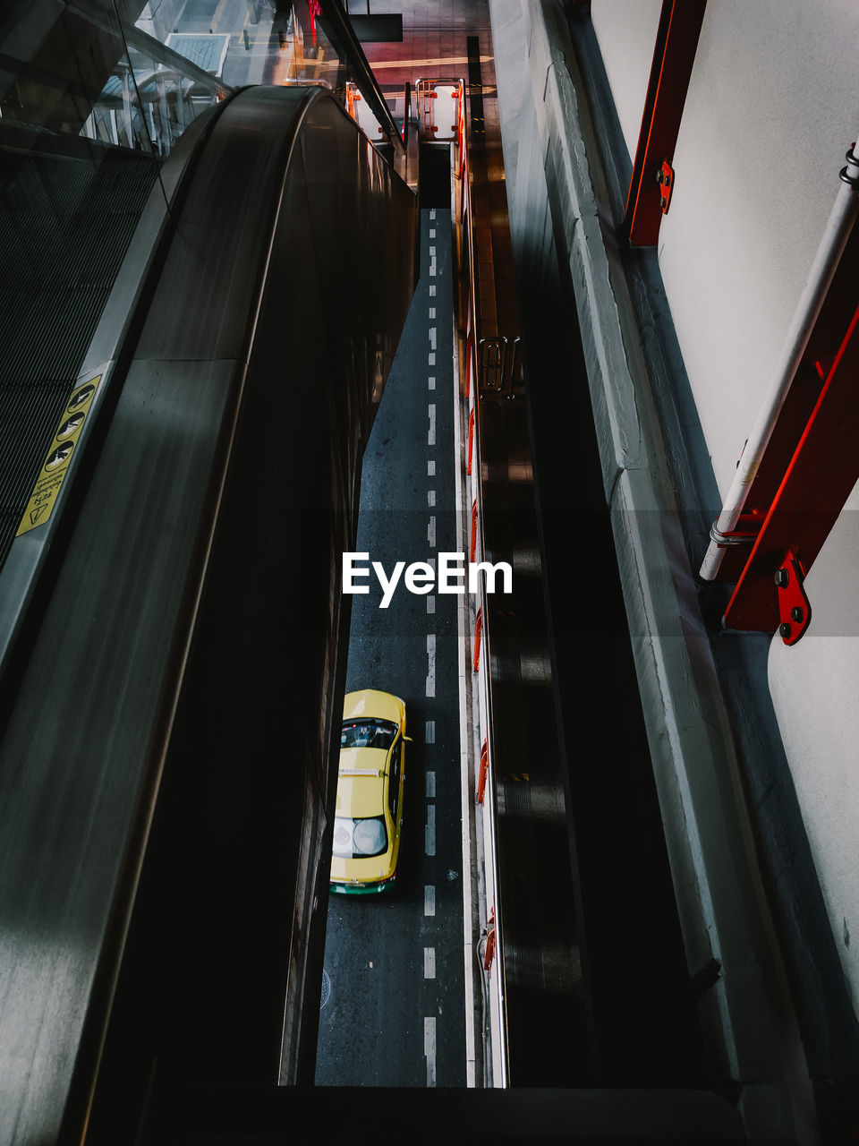 High angle view of vehicles on railroad tracks