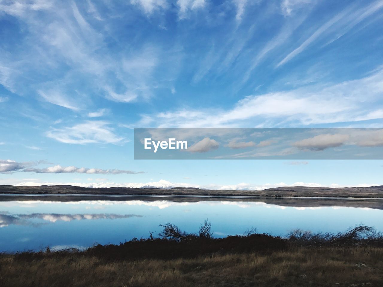 Scenic view of lake against sky