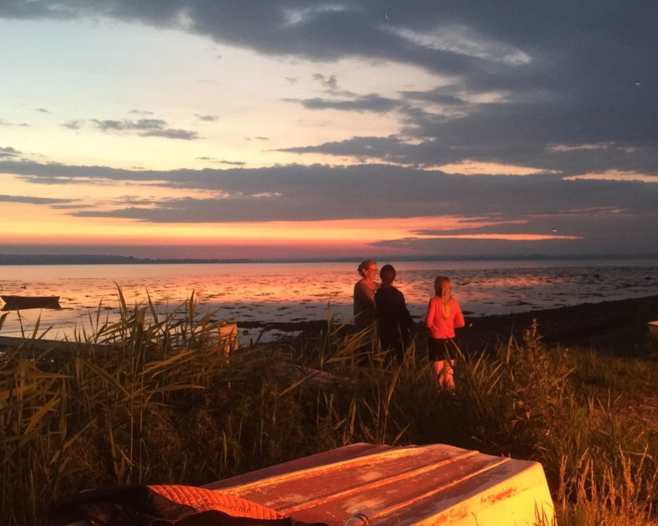 SCENIC VIEW OF SUNSET OVER SEA