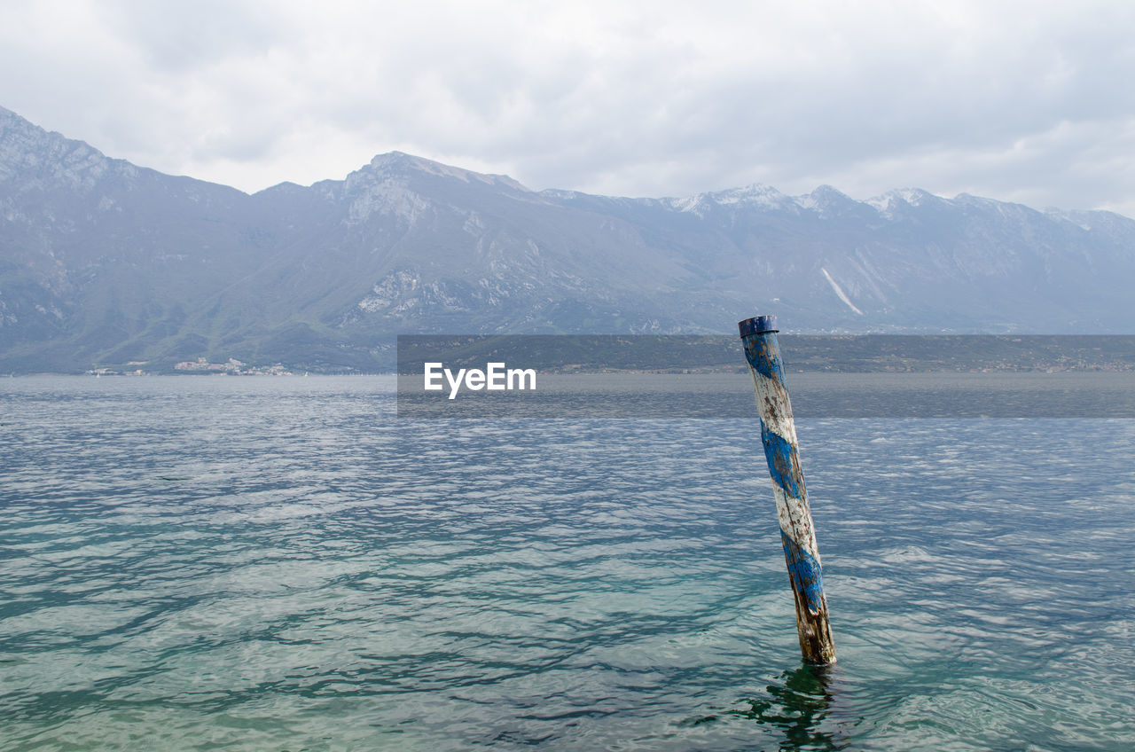 Scenic view of lake by mountain