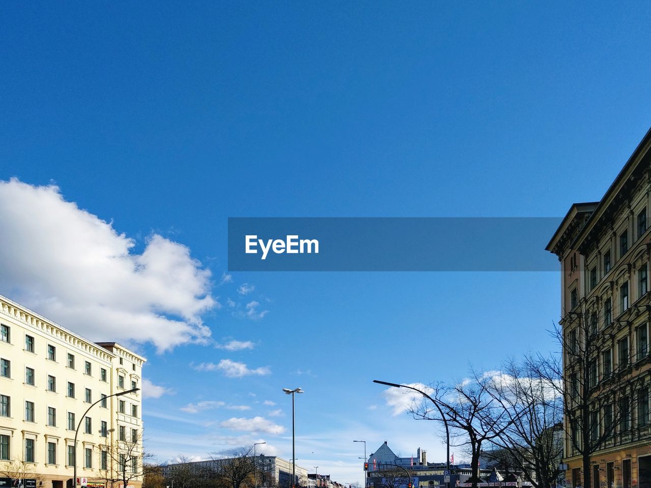 Low angle view of buildings against blue sky