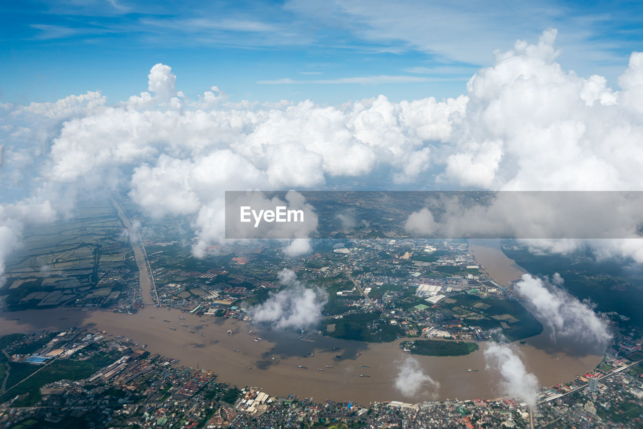 Aerial view of cityscape against sky