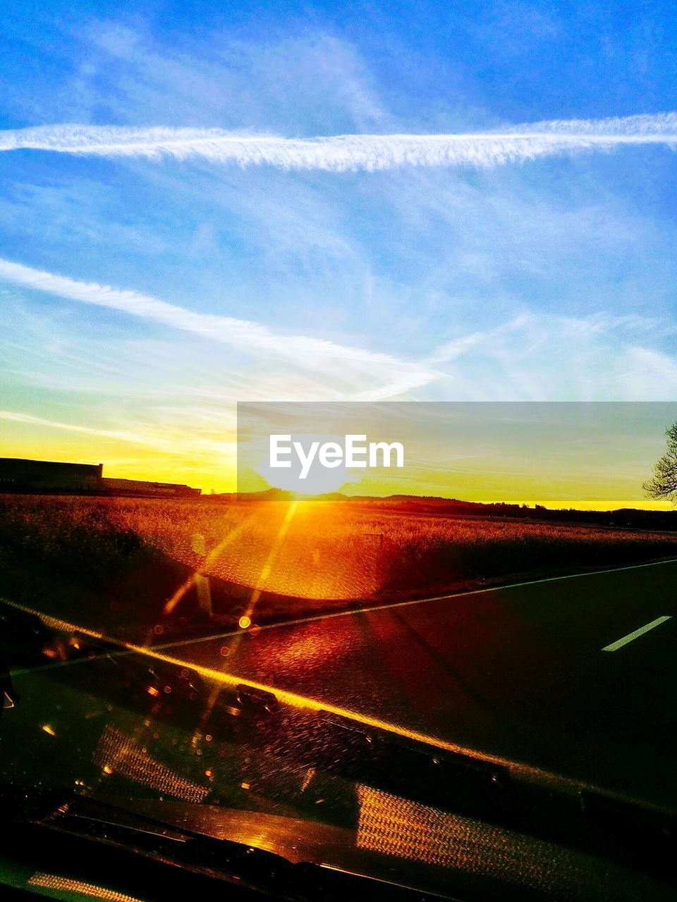 SCENIC VIEW OF LANDSCAPE AGAINST SKY DURING SUNSET