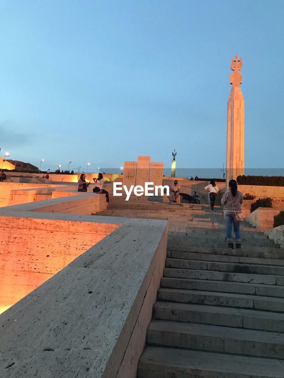 PEOPLE WALKING ON STAIRCASE