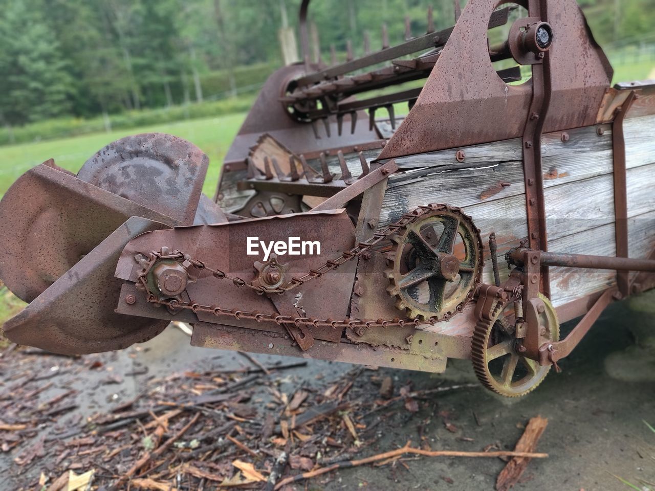 Old rusty machinery on land 
