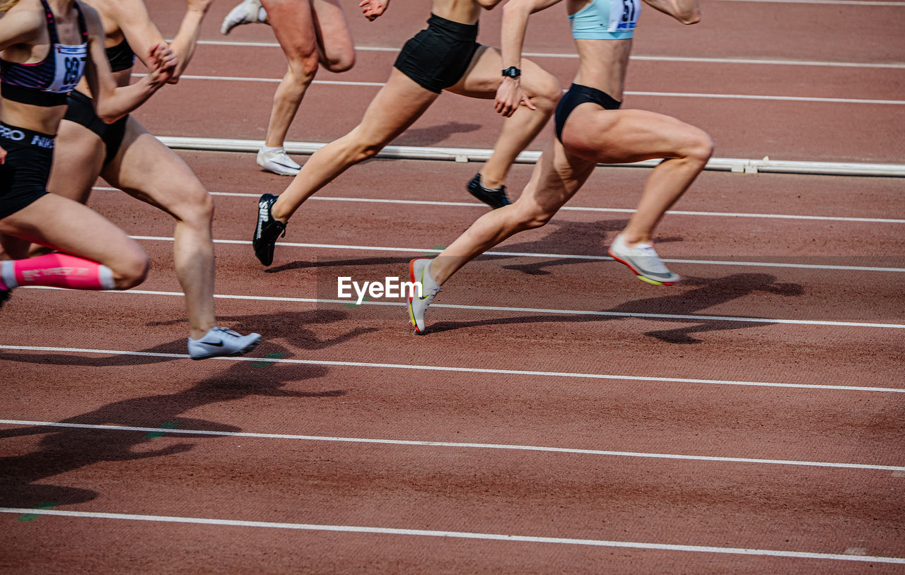 high angle view of people exercising on floor