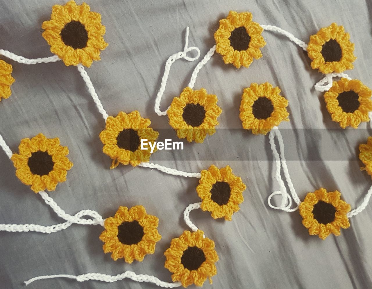 High angle view of crochet sunflowers