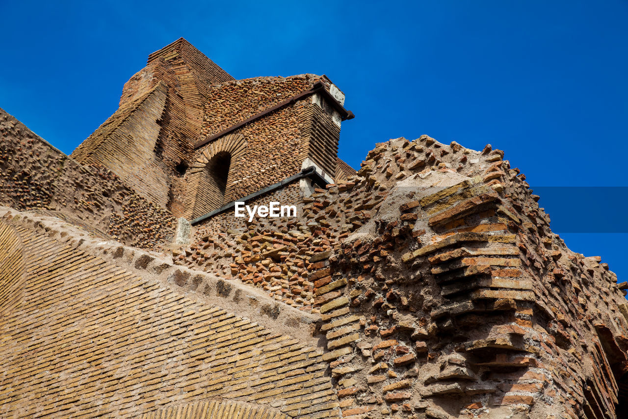 Detail of the walls of the famous colosseum in rome