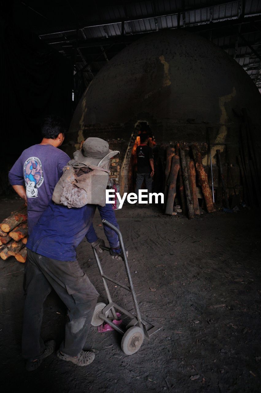 GROUP OF PEOPLE WORKING AT CONSTRUCTION