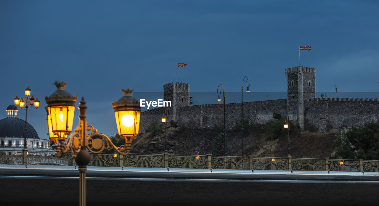 Evening city castle skopje in macedonia in the evening and street lamp. selective focus