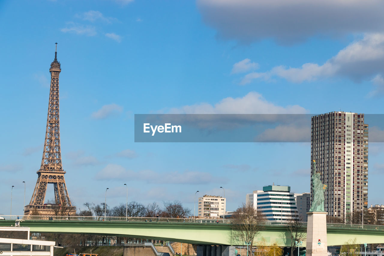 View of buildings against cloudy sky