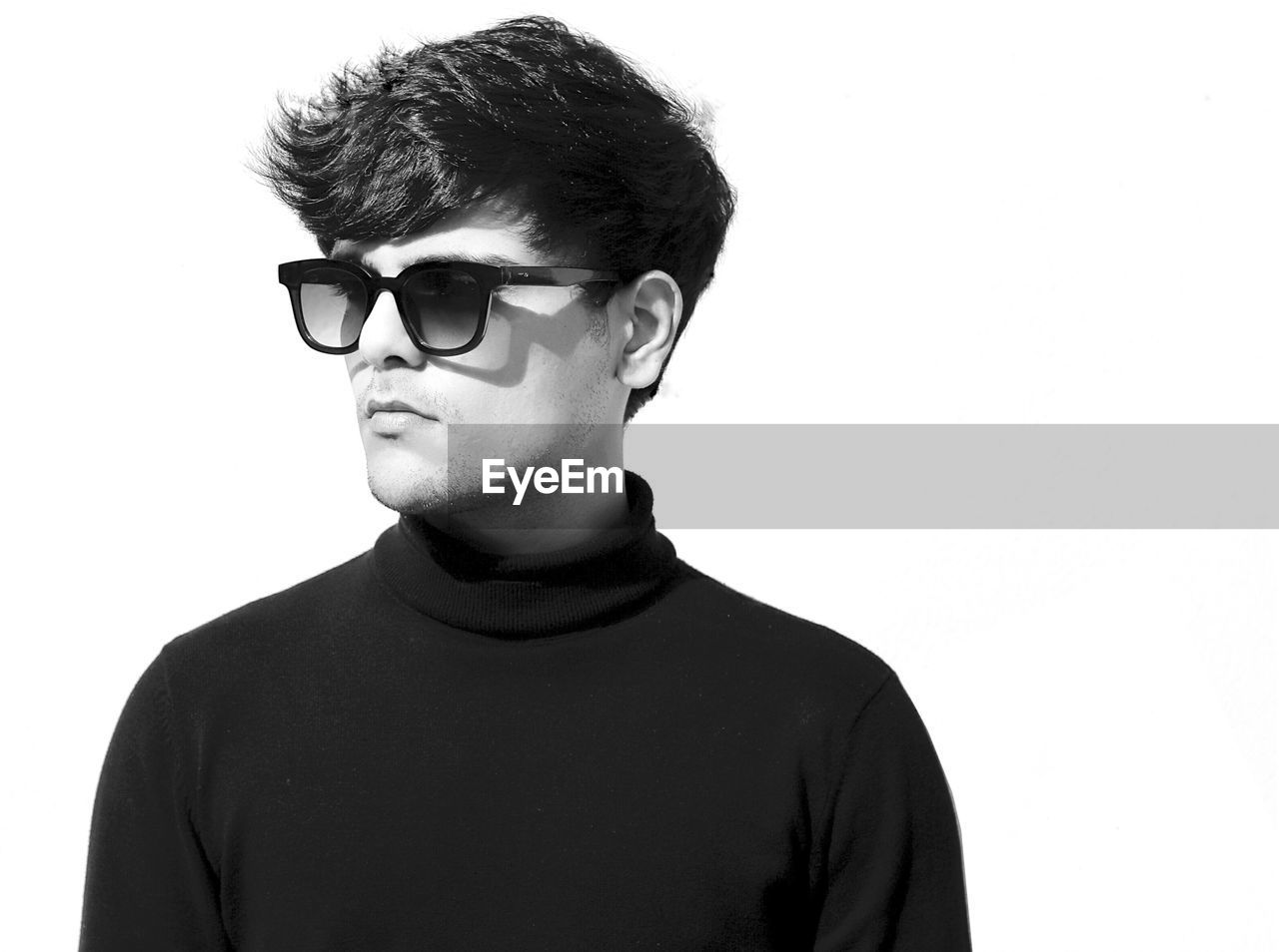 glasses, black, eyewear, one person, portrait, vision care, hairstyle, young adult, black and white, eyeglasses, fashion, studio shot, white background, headshot, moustache, casual clothing, indoors, men, cut out, human hair, t-shirt, adult, human face, sunglasses, looking, monochrome photography, front view, copy space, cool attitude, facial hair, serious, goggles, person, clothing, white, monochrome, looking away, contemplation