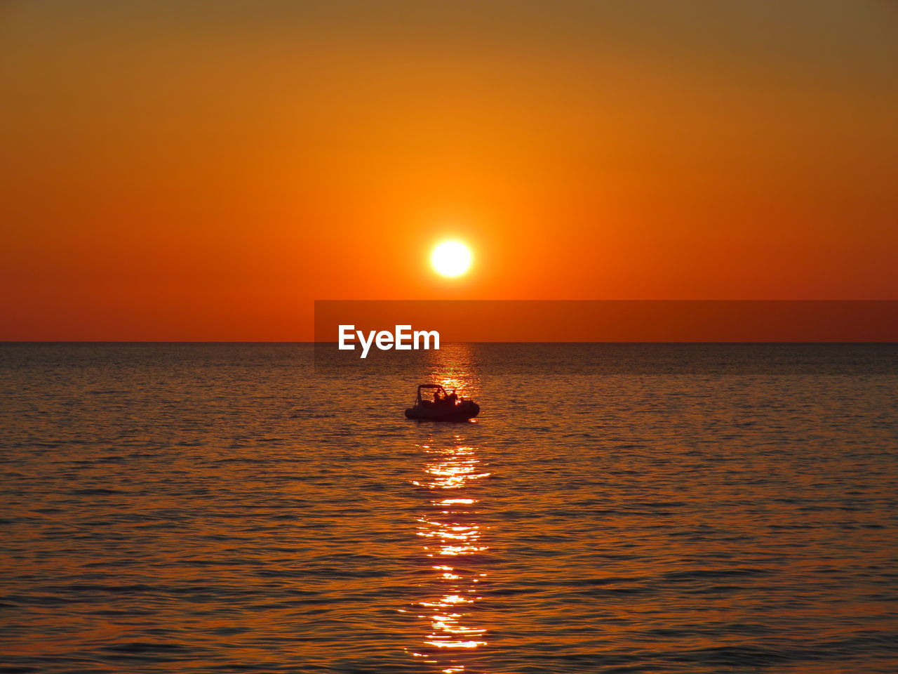 SCENIC VIEW OF SEA DURING SUNSET