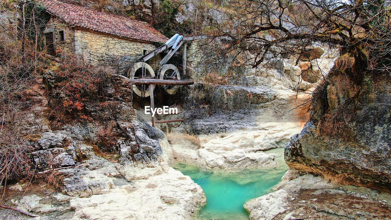 WATER FLOWING THROUGH ROCKS