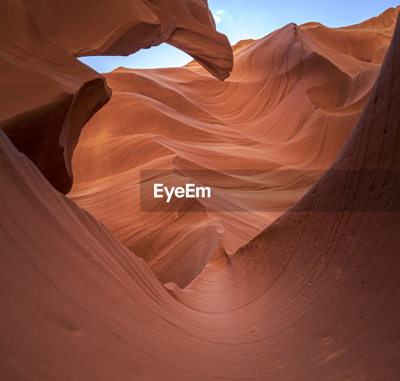 Picturesque landscape of lower antelope slot canyon with red sandstone located in desert arid terrain of united states of america