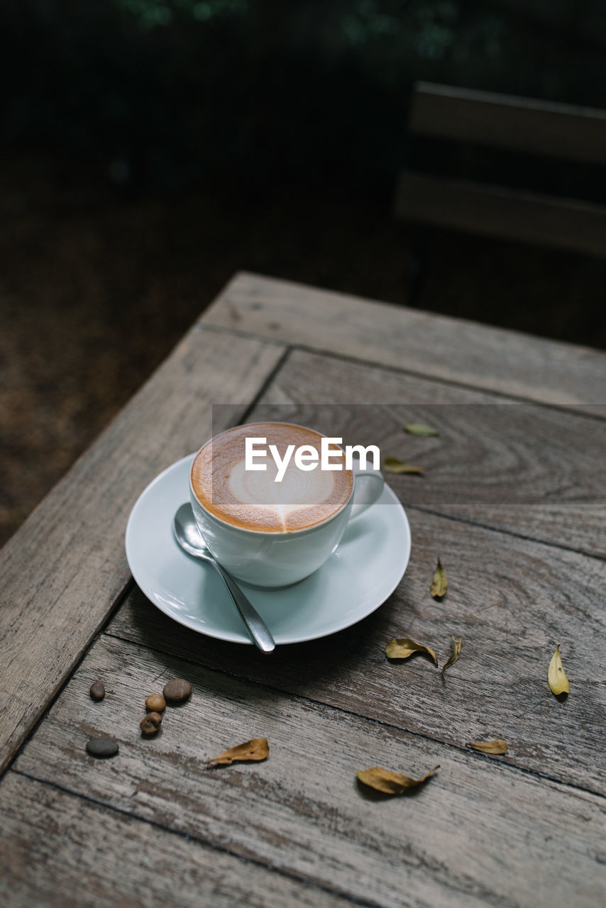 Close-up of cappuccino on table