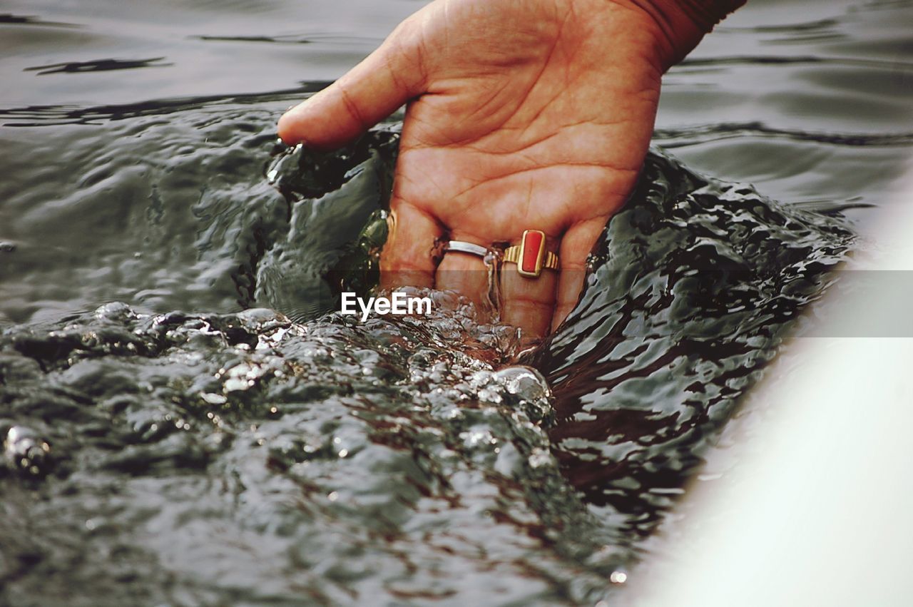 Close-up of cropped hand