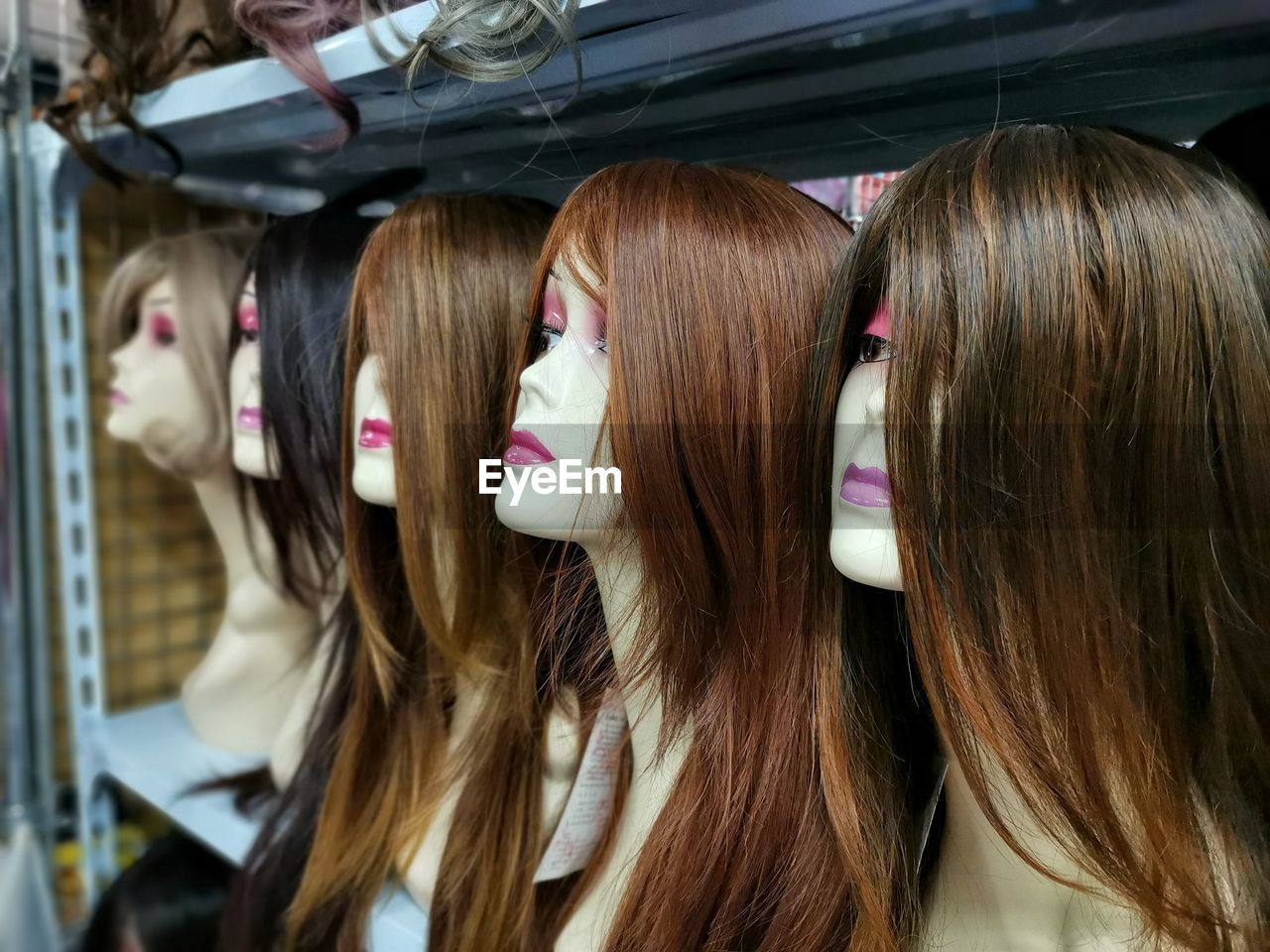 Close-up of mannequins at store